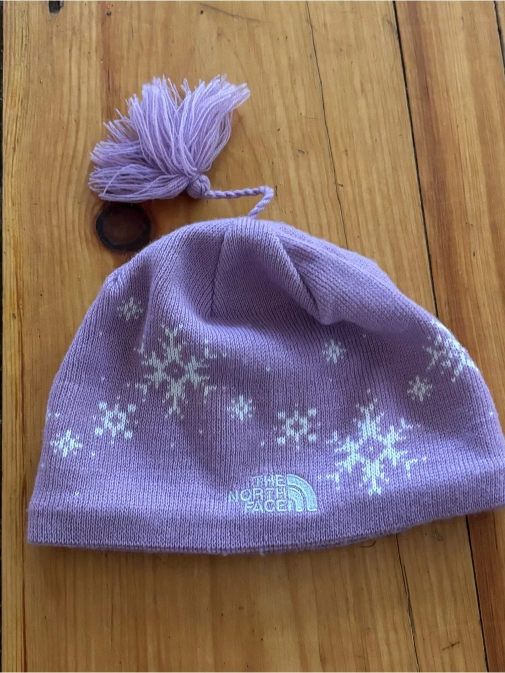The North Face Purple Snowflake Fleece Lined Tassel Beanie Hat Girls